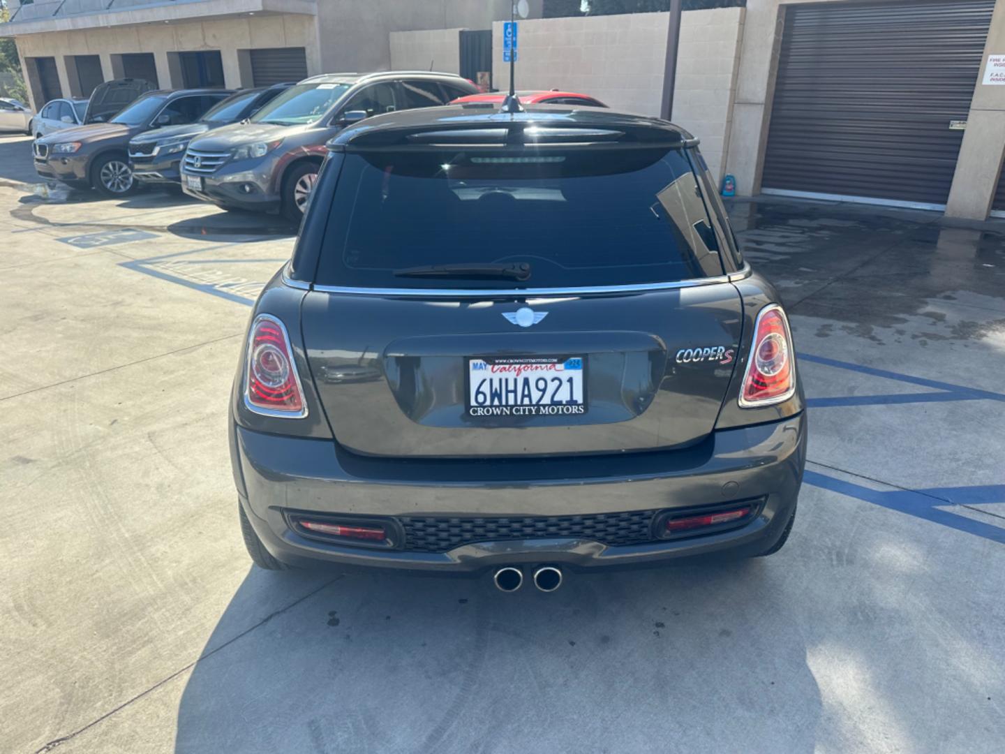 2012 Black /Black Mini Cooper Cloth (WMWSV3C52CT) with an 4Cylinder engine, Manual transmission, located at 30 S. Berkeley Avenue, Pasadena, CA, 91107, (626) 248-7567, 34.145447, -118.109398 - Tank : 13.20 Anti-Brake System : 4-Wheel ABS Steering Type : Rack & Pinion Front Brake Type : Disc Rear Brake Type : Disc Turning Diameter : 35.10 Front Suspension : Ind Rear Suspension : Ind Front Spring Type : Coil Rear Spring Type : Coil Tires : 195/55R16 Front Headroom : 38.80 Re - Photo#3